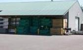 Building supplies next to warehouse